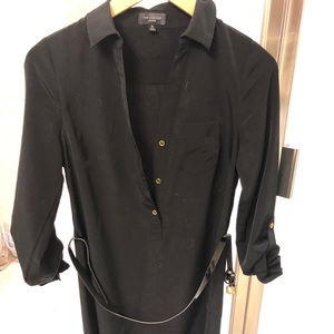 Black dress with gold buttons